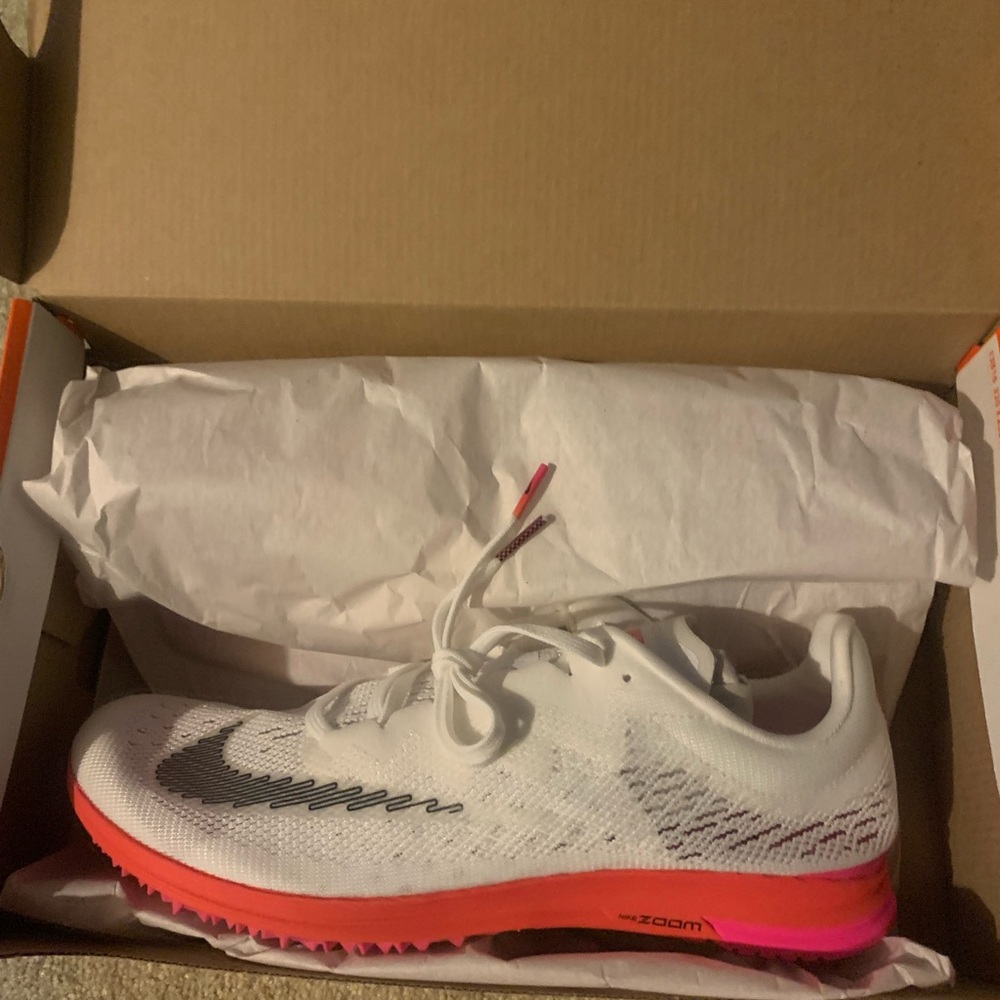 White and Pink Athletic Shoes